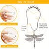 A set of silver-toned dragonfly shower curtain hooks being shown in the process of being squeezed to close and open.