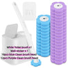 Disposable toilet brush refills including a long handle, wall sticker, blue and purple clean brush heads, and a storage unit.
