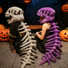 A person wearing a realistic dinosaur skeleton costume set, featuring gray and purple skeletal props, in a spooky Halloween-t