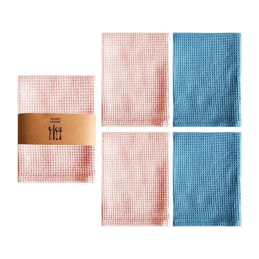 A set of four pink and blue absorbent 100% cotton waffle weave towels.