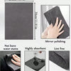 A stack of dark gray microfiber cleaning cloths showing dimensions and features like water resistance and lint-free quality.