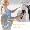 A woman is using flexible steam engine gloves to steam a white garment on a hanger.