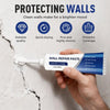 A hand holds a tube of white wall repair paste, demonstrating its use for protecting walls.