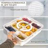 A hand holds a clear food-grade organizer tray filled with various fruits and vegetables inside a refrigerator.