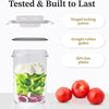 A clear plastic food storage container set with lids, showing fresh green peppers and red tomatoes.