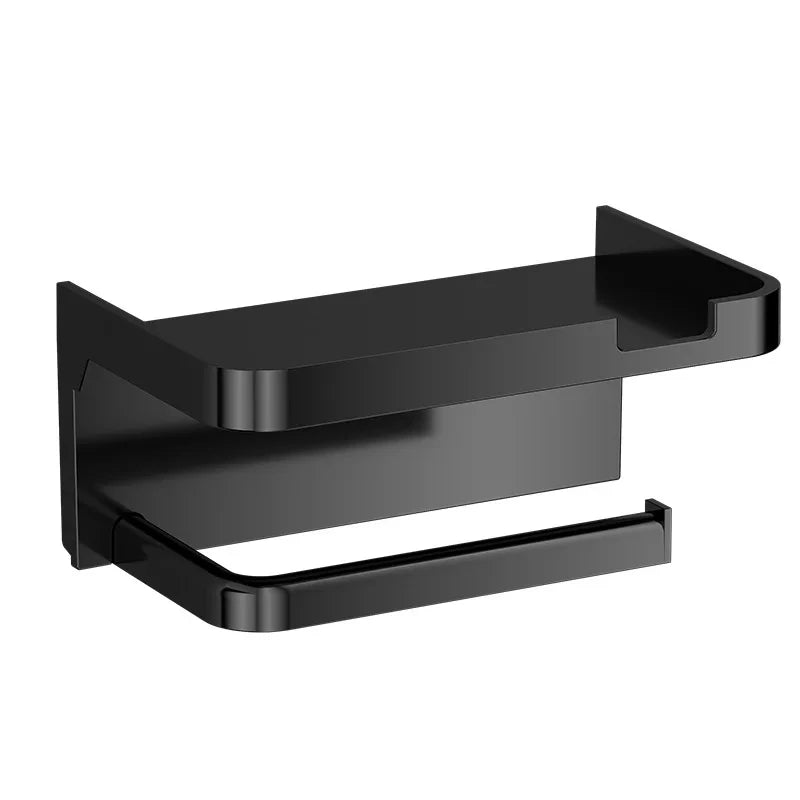 A black no-drill toilet paper holder with a storage shelf and a curved grip.