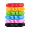 A stack of ten natural mosquito repellent bracelets in various bright colors: red, yellow, green, blue, pink, and black.
