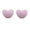 A pair of light purple silicone heart charm beads for DIY jewelry.