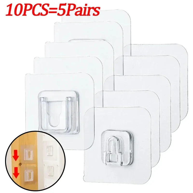 Ten pairs of white double-sided adhesive wall hooks shown in a stack and close-up view