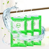 Green hanging bags filled with moisture absorbers are shown hanging from a wooden bar.