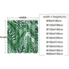 A set of green tropical leaf patterned shower curtains with various width and height options.