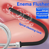 A black enema flusher with a silicone hose is shown inside a pink cleaning tank.