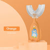 Orange penguin shaped silicone toothbrush for kids displayed on a stand.