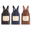 Three waterproof sleeveless kitchen aprons in black, navy blue, and brown with removable hand towels.