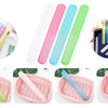 Various colored travel and storage toothbrush cases shown in various angles and on a pink woven tray.
