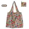 Wiederverwendbare Tasche mit Blumenmuster in rosa, orange und grünen Tönen.
