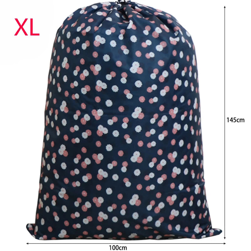 Large capacity drawstring storage bag for laundry and bedding in navy blue with pink floral pattern
