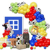 A colorful balloon garland featuring yellow, green, red, and blue balloons with cow print patterns.
