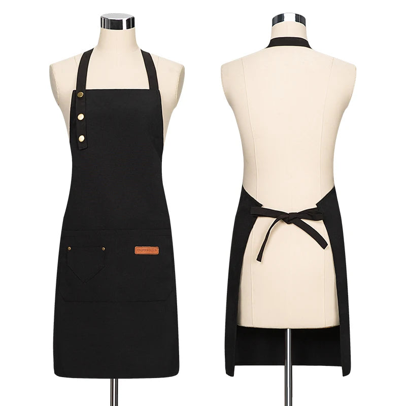 Black all-purpose canvas apron displayed on a mannequin.