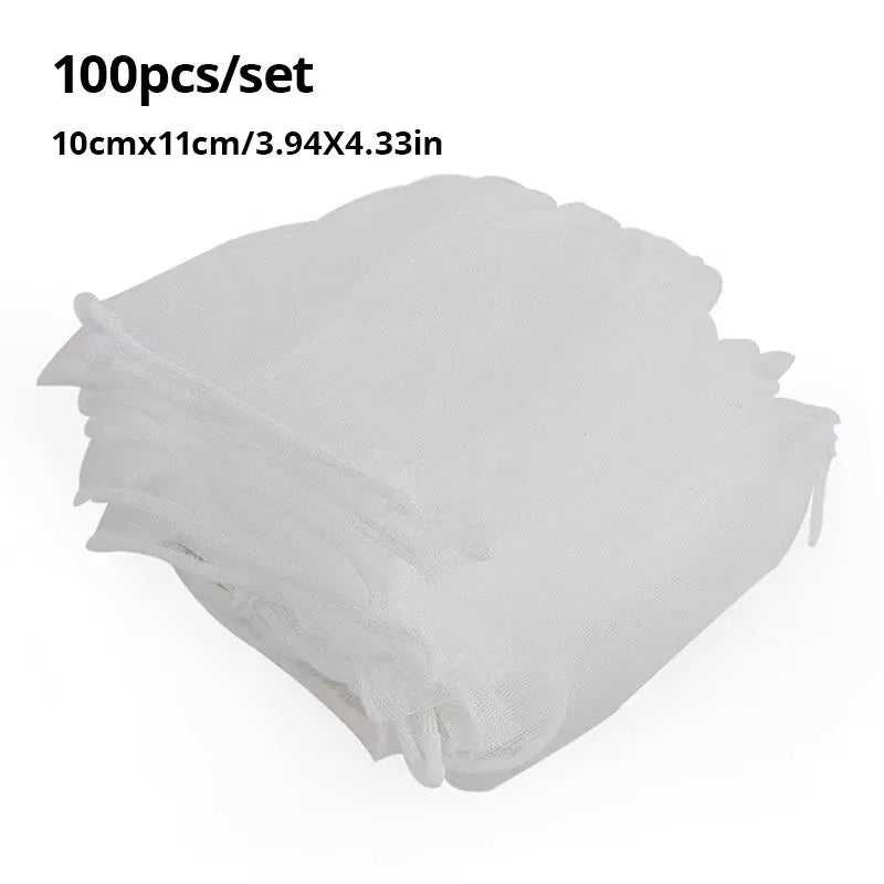 A stack of 100 white disposable sink drain filter bags, measuring 10cm x 11cm.