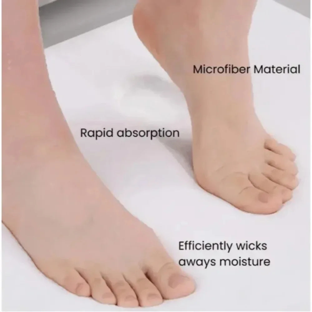 Close-up of a foot resting on a white surface, demonstrating the rapid absorption and moisture-wicking properties of a microf