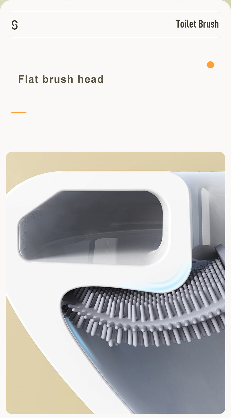 Gros plan d'une tête de brosse plate en silicone blanche nettoyant l'intérieur d'une cuvette de toilette.