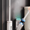 A wall-mounted toilet brush cleaning kit with a white handle and blue base is shown next to a toilet.