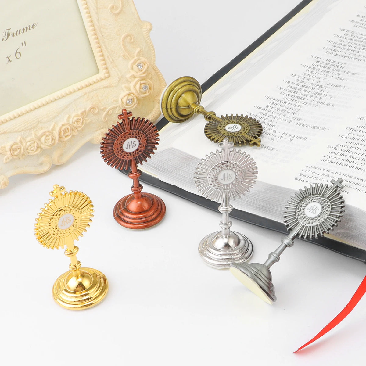 A set of mini metal religious ornaments featuring a cross design in gold and silver tones.
