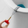 A hand is lifting the lid of a toilet using a gray portable toilet lid lifter tool.