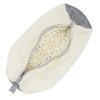 A cream-colored storage bag for shoe cleaning tools with a gray lining and visible brush bristles.