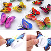 A collection of luminous 3D butterfly wall lights in various colors and patterns.