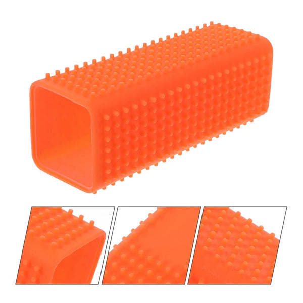 Orange silicone pet hair remover brush with a textured surface shown from the side and angled views.