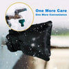 A black reusable insulated faucet cover is shown against a snowy outdoor background.
