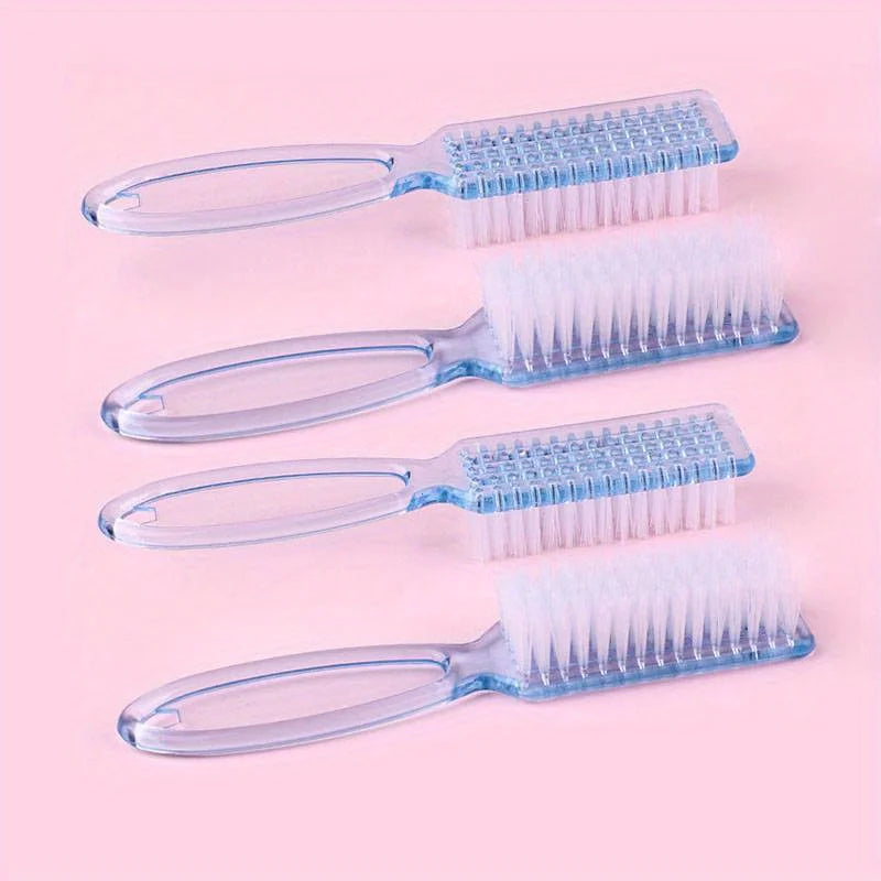 A set of four plastic brushes with silicone handles and bristles for nail art and dust cleaning