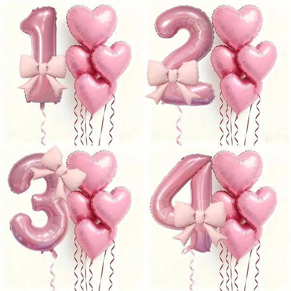 A set of six pink heart-shaped foil balloons forming the numbers 1, 2, 3, and 4.