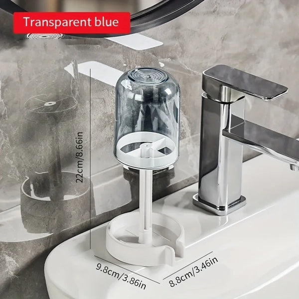 A transparent blue multi-compartment toothbrush holder with a chrome faucet mounted on a white sink.