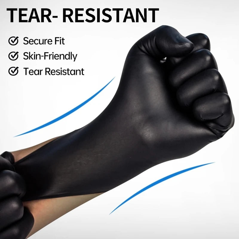 A close-up of a black tear-resistant glove being clenched into a fist.