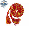 Red and yellow graduation honor cord with tassel ends coiled into a spiral.