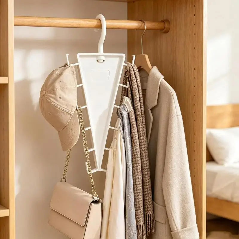 A wooden closet organizer displaying various clothing items and accessories hanging on multi-hook hangers.