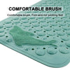 A teal silicone bath mat featuring a molded dolphin design for comfortable and firm brushing.