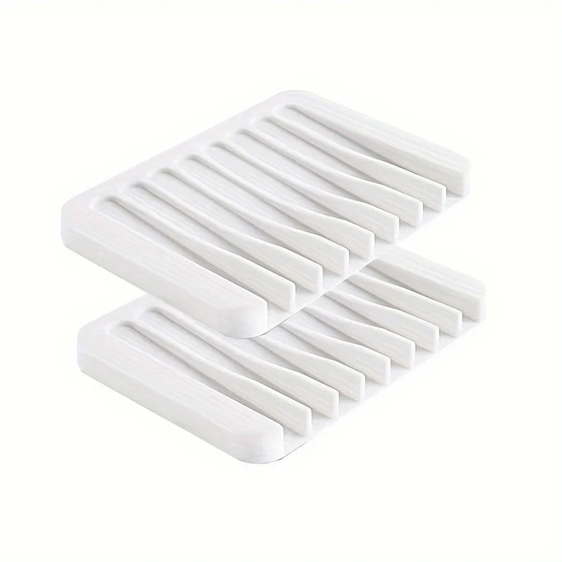 White self-draining silicone soap dish with an anti-slip base