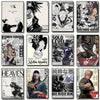 A collection of posters featuring various anime and manga characters and artwork.