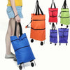 A collection of colorful foldable hand drawn shopping bags in various colors like orange, red, green, and blue.