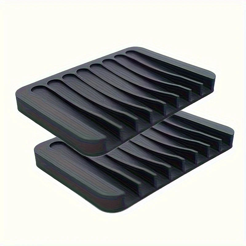 Black silicone self-draining soap dish with an anti-slip base