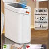 A white Joybos automatic sensor trash can demonstrating its opening and closing mechanism.
