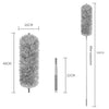 A long, fluffy green microfiber duster with an extendable handle and a dense head.