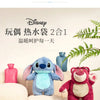 Two plush toys, one blue and one red, are shown next to a Disney themed hot water bottle product.