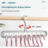 A set of space-saving 9-hole clothes hangers shown in various configurations and materials.