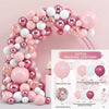 A pink and white round foil balloon garland kit featuring various shades of pink and white balloons.
