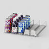 A silver automatic can dispenser and beverage organizer holding various canned drinks in a refrigerator.